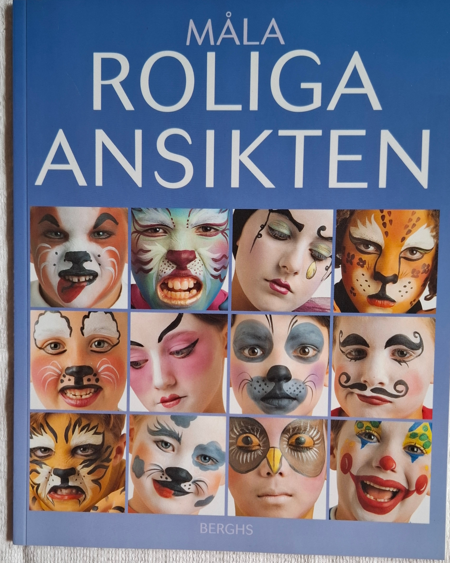 Bok med ansiktsmålning