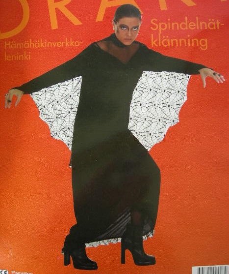 Spindelnäts klänning