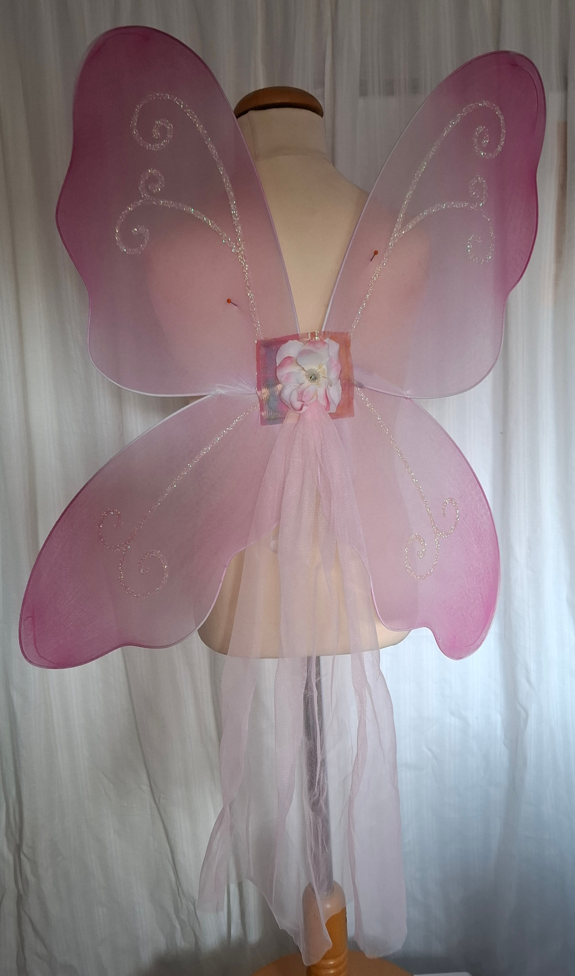 Fjärilsvingar i rosa